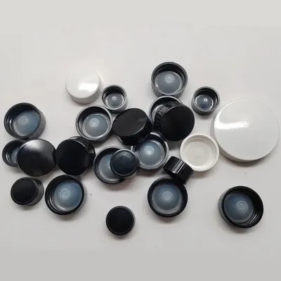 Tapones fenólicos (de baquelita) blancos y negros