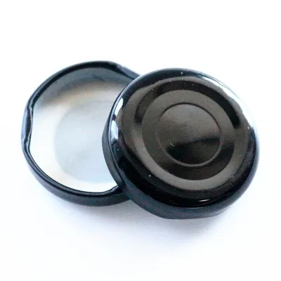 Tapones metálicos negros de orejetas con revestimiento de plastisol
